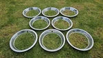Set Of 8 Vintage Stainless Beauty Rings 15" Rally Wheels 4 Trim Rims. Fixed Price $149.00.