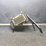 21182-00, 21183-00, 21184-00 Piper PA-24-250 Oil Cooler With Brackets. Fixed Price $452.00.