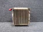 10557A Stewart-warner Lubricating Oil Cooler (worn). Fixed Price $196.00.