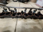1998 Lincoln Continental Lower Intake Manifold Fuel Rail Injectors. Fixed Price $294.95.