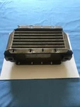10877A Heat Exchanger Stewart Warner Oil Cooler. Fixed Price $125.00.